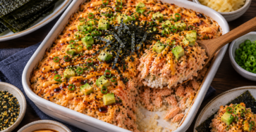 Salmon Sushi Bake final dish with creamy baked salmon, sushi rice, avocado, seaweed, spicy mayo, and green onions